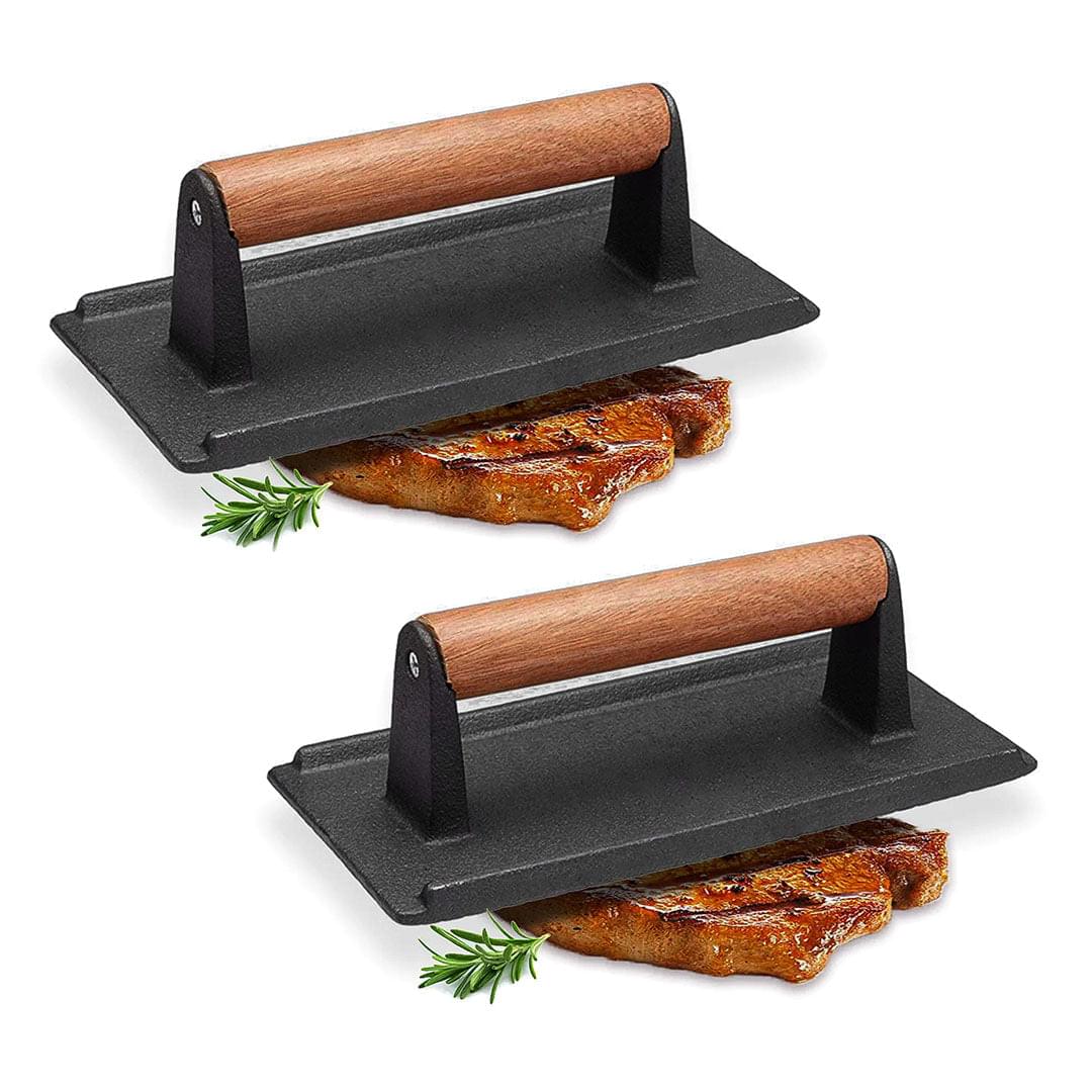 Cast iron bacon press grill weight plate with wooden handles and bacon pieces
