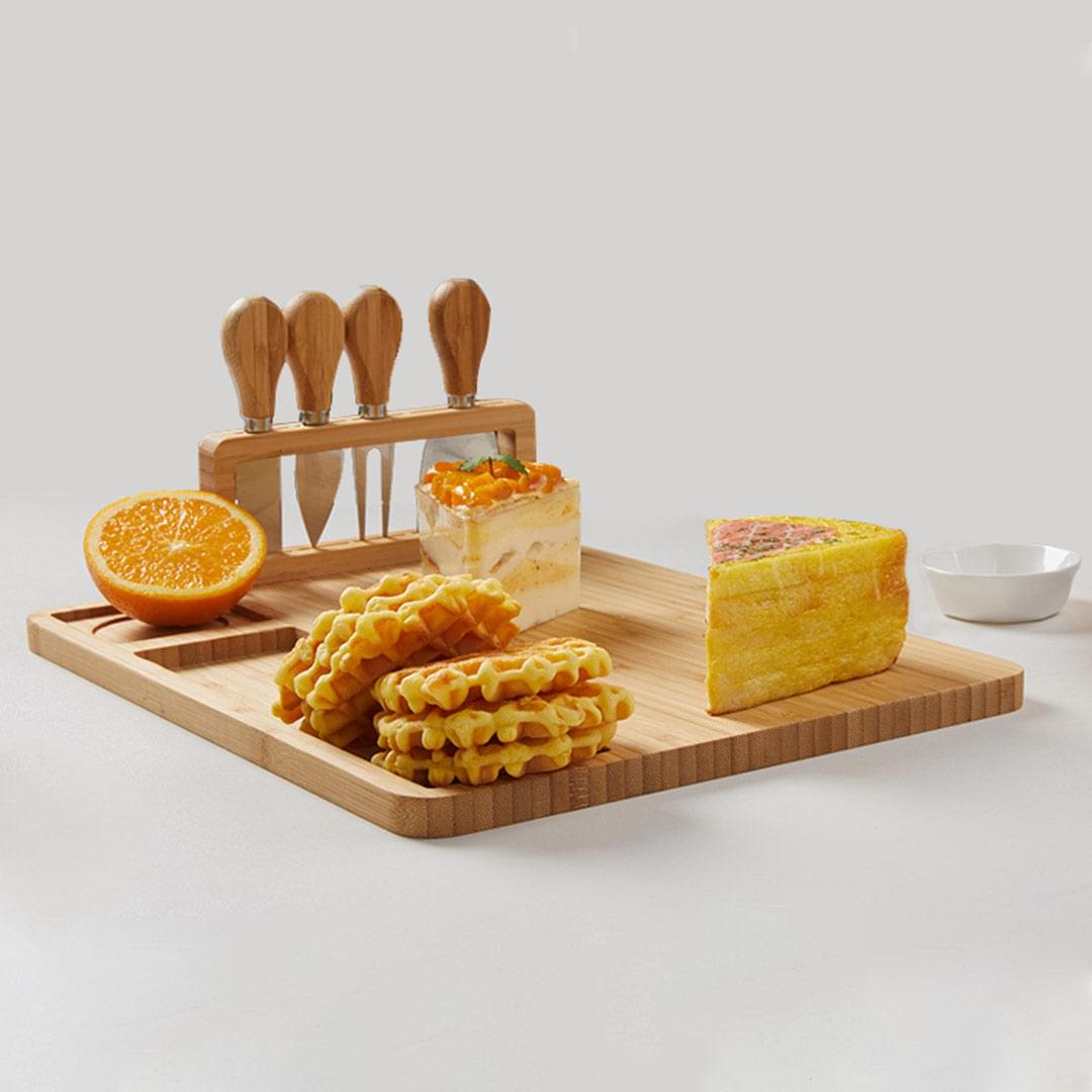Rectangular wooden cheese board with knife rack and carved serving compartments