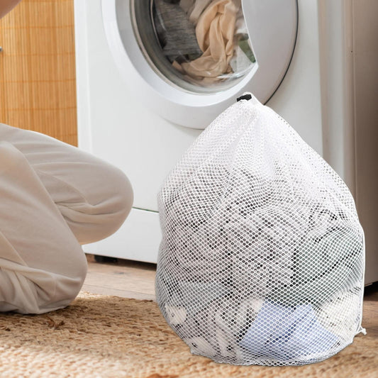 White diamond-mesh laundry bag with drawstring, standing upright.