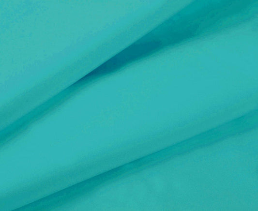 Teal sheet fabric close-up with smooth wrinkle-free finish