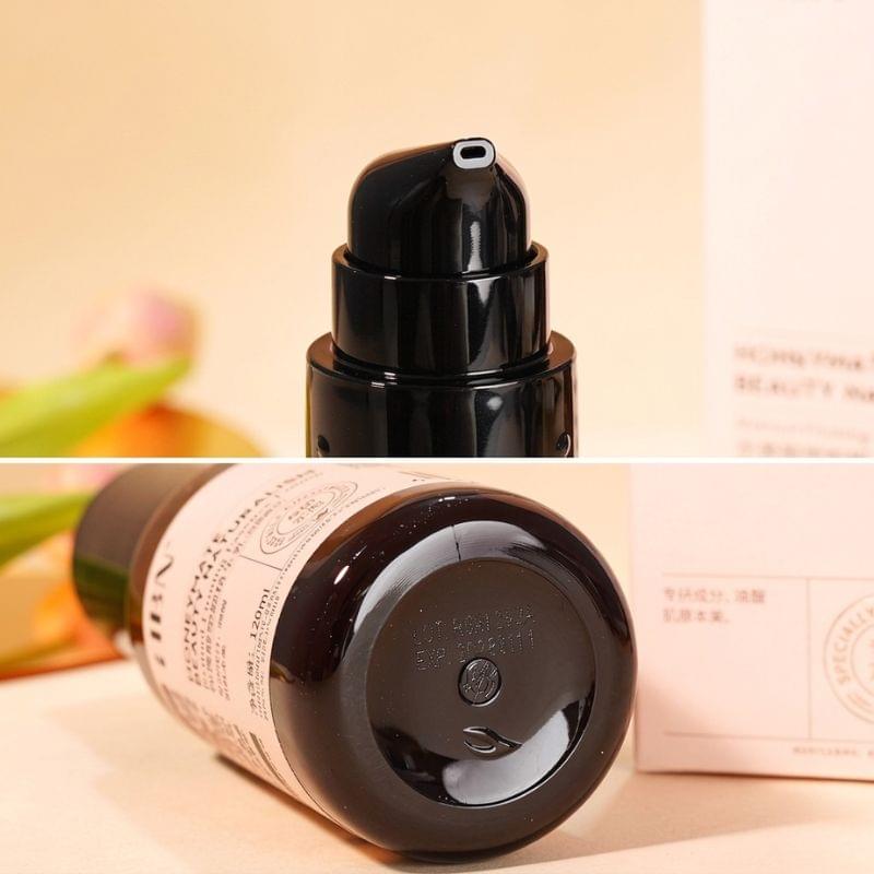 HBN retinol firming serum bottle and box with black flip-top cap, close-up