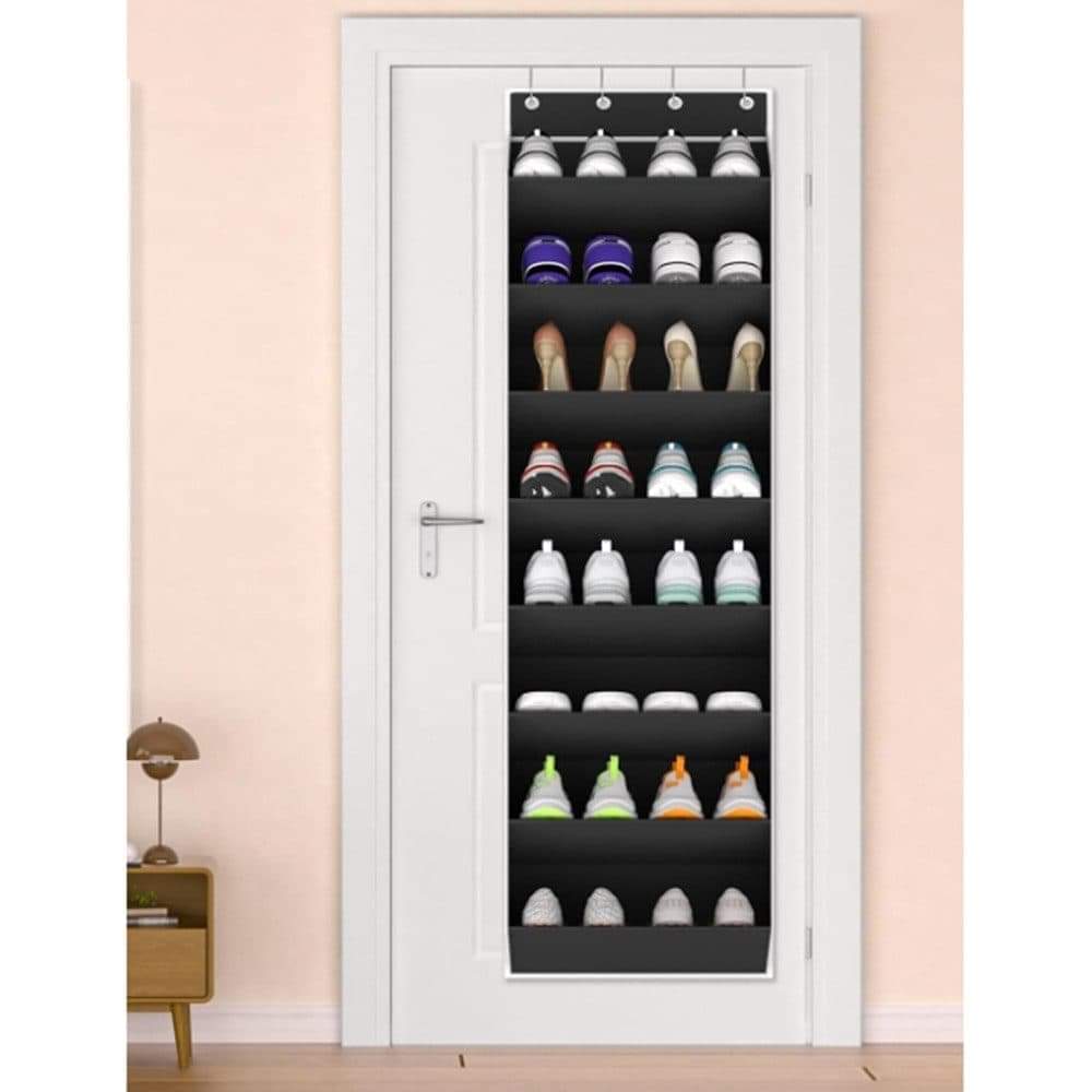 Black shoe storage organizer hanging on a door with top hooks and stacked shoe shelves.