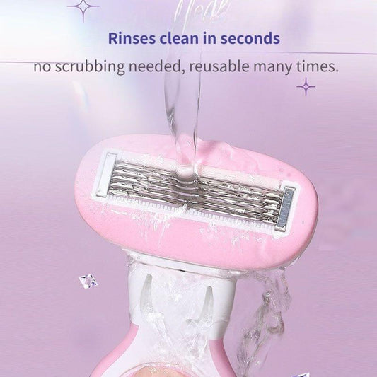 Pink underarm razor being rinsed over sink, 5-blade head visible