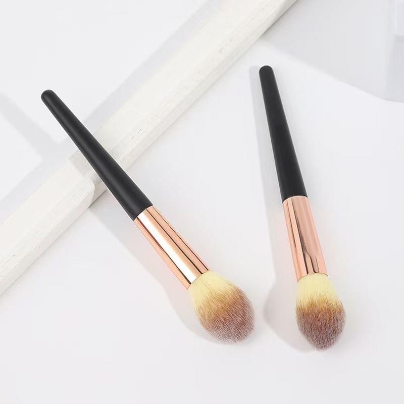 Blush and powder brush set: two black-handled brushes with rose-gold ferrules and soft bristles