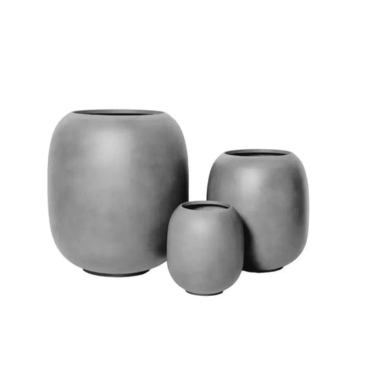 Matte dark grey ceramic vase set of three with open tops and rounded shapes
