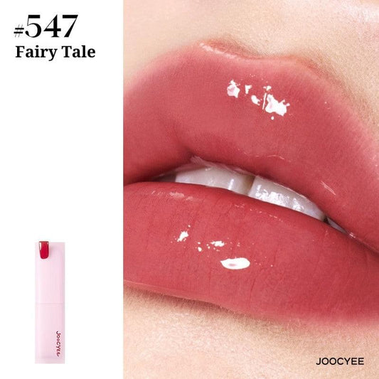Glazed rouge on lips: glossy rose-red shade #547 Fairy Tale