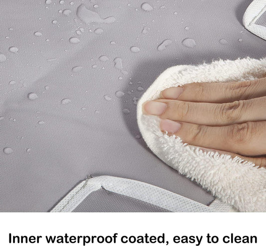 Gray waterproof-coated laundry bag liner, hand smoothing fabric surface