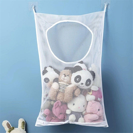 White wall-hanging laundry hamper bag with circular opening, filled with plush toys