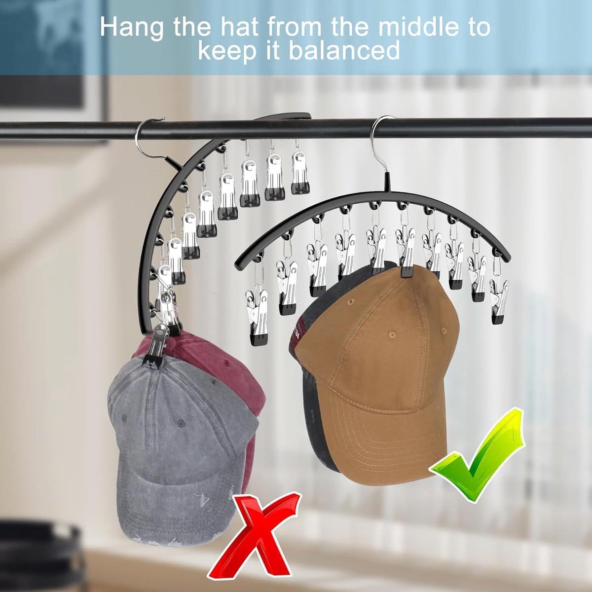Black arched hat hanger with clips, centered hook helps keep caps balanced