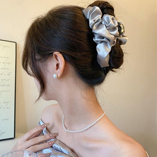 Large metallic silver pleated satin French hair claw clip with ruffled fabric