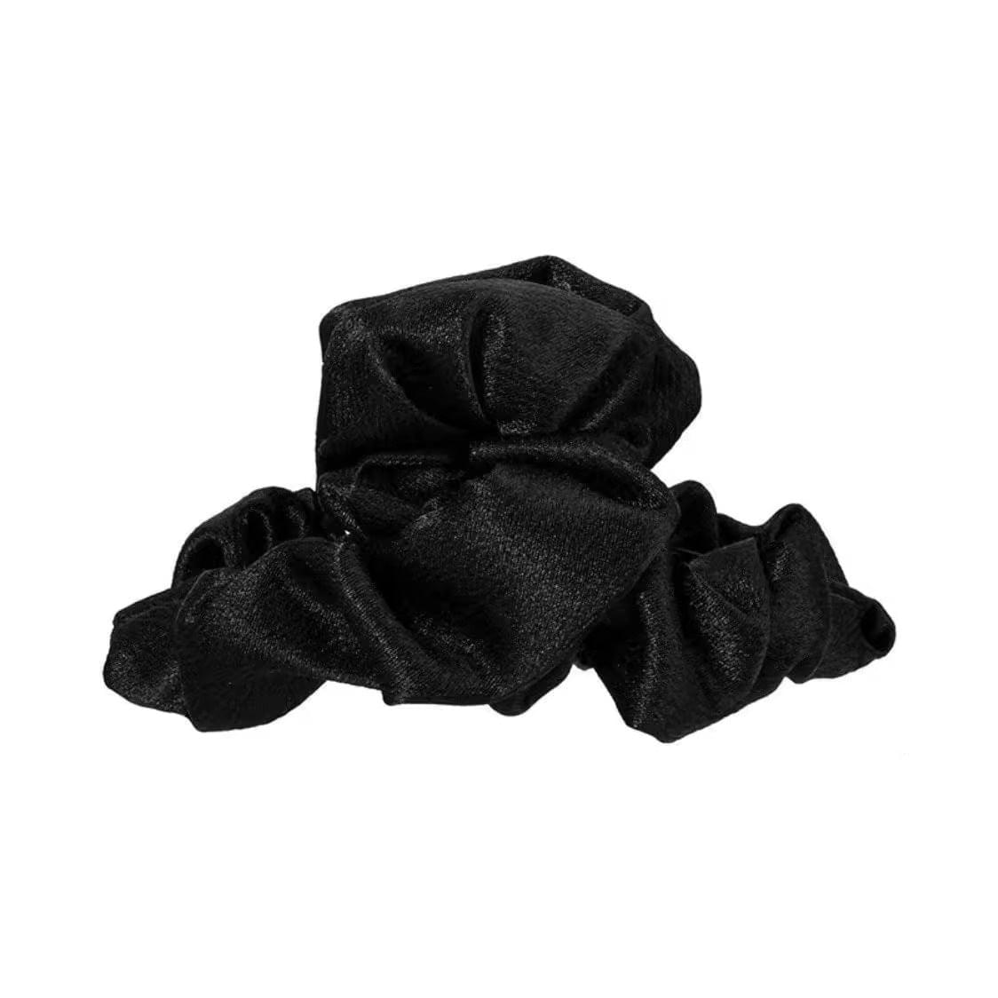 Single large black pleated satin French hair claw clip with ruffled fabric texture