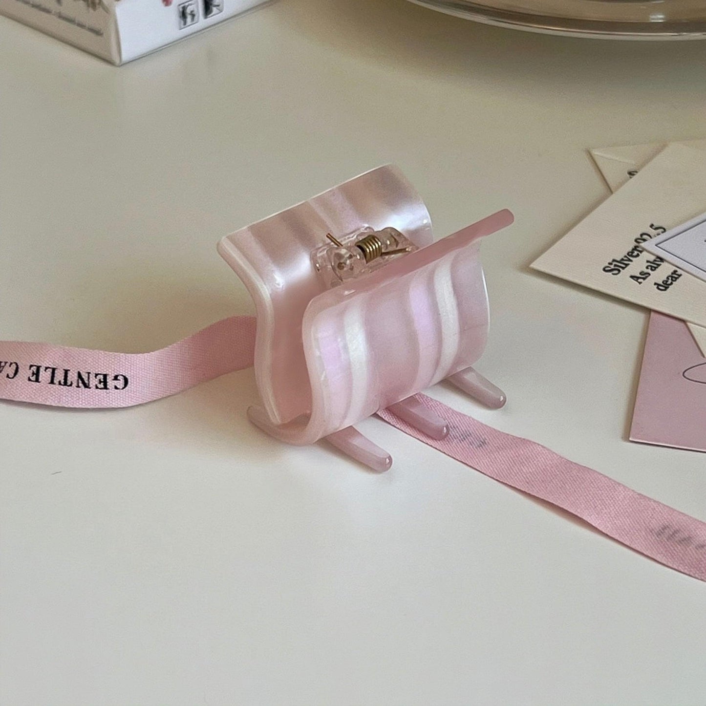 Small pink striped square claw hair clip with metallic spring hinge