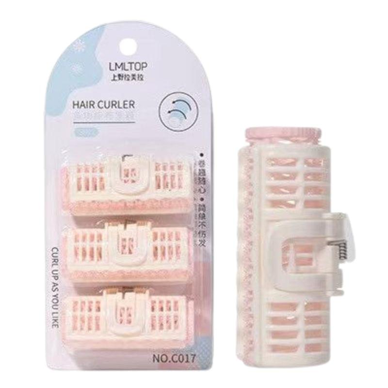 3-piece small hair curler set with clear case holding pastel pink rollers