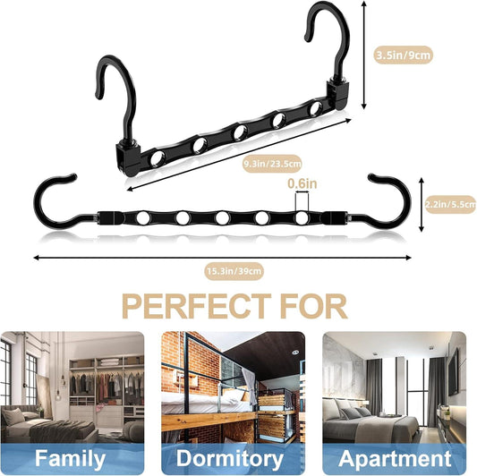 Black plastic multi-hanger set with curved hooks and row of hanging loops