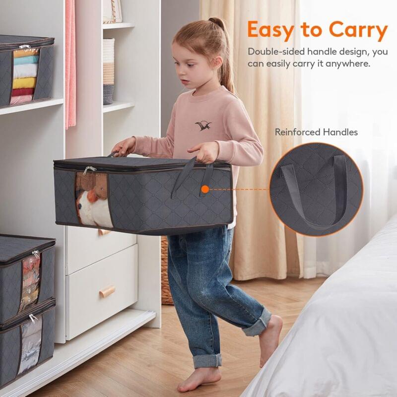 Dark gray quilted storage box with reinforced handles and clear window, being carried