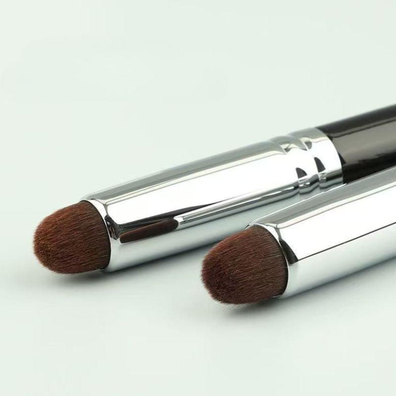 Set of two bullet concealer brushes with brown bristles and chrome handles