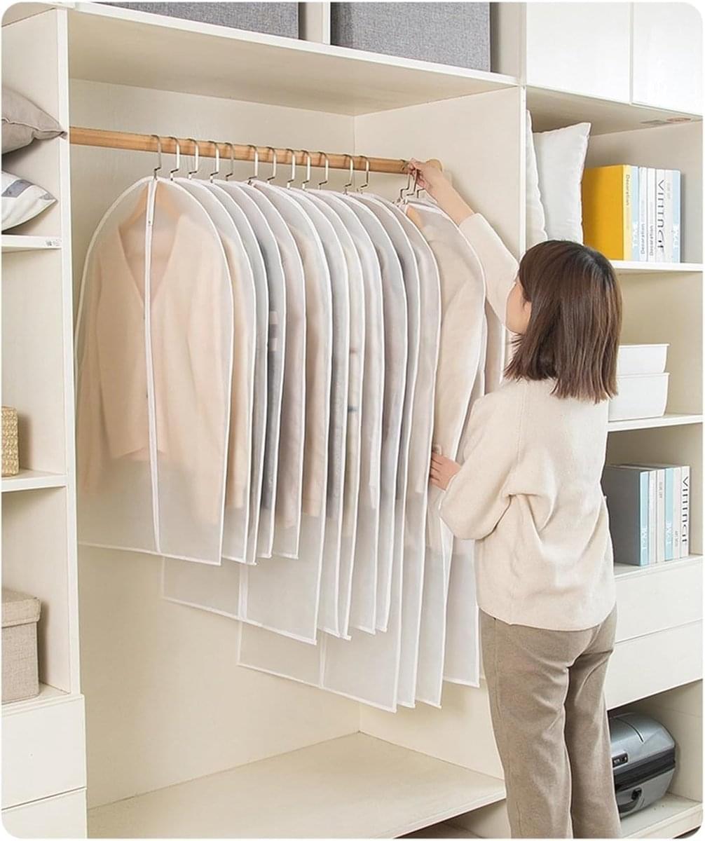 Translucent hanging garment storage bags with arched tops and central zippers