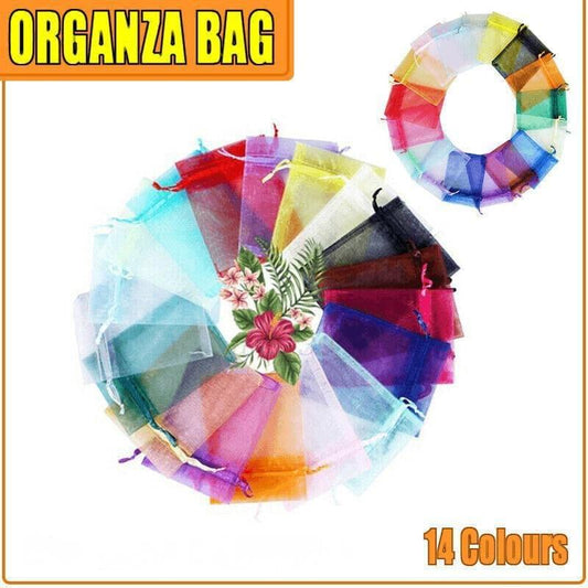 Assorted color organza drawstring bags shown as a ring of sheer pouches