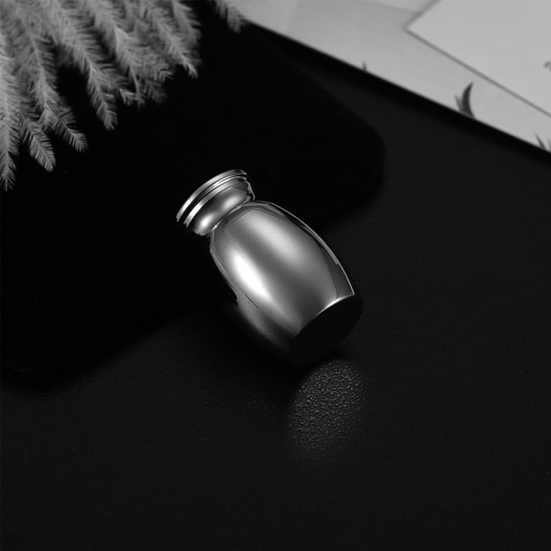 Steel mini memorial urn, lying on side with threaded top, silver finish