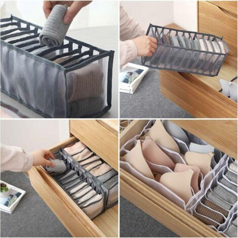 Foldable gray underwear storage organizer with dividers placed inside a drawer