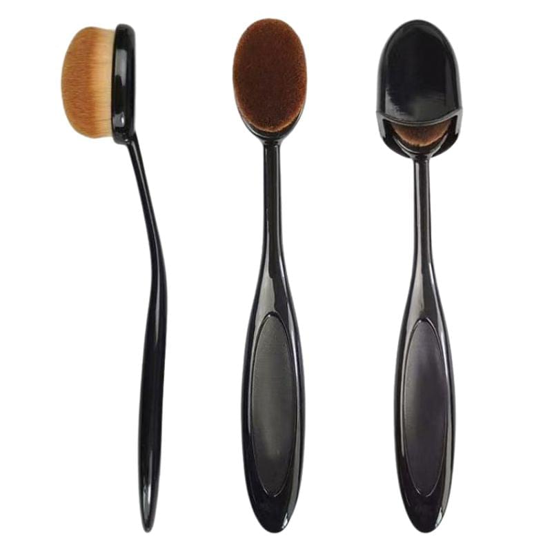 Three flat foundation brushes with oval bristle heads and black handles