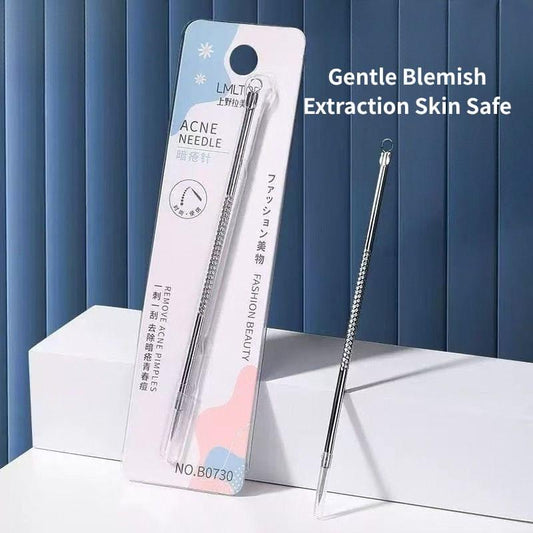 Stainless steel acne needle extractor tool shown with retail blister packaging
