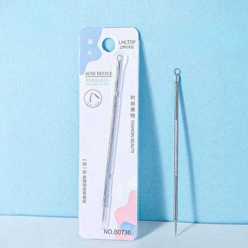 Stainless steel acne needle extractor tool with clear needle tip and blister card packaging