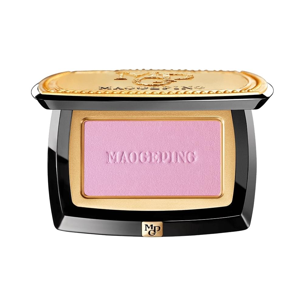 Blush makeup compact with light purple shimmer pan in black and gold case