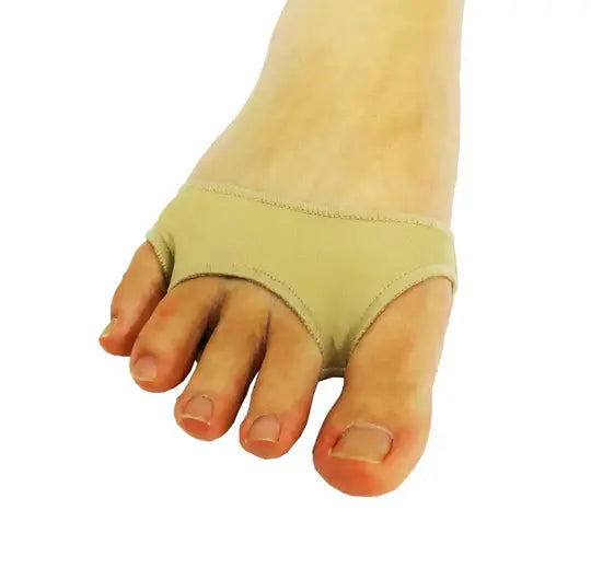 Light yellow gel forefoot pad on foot, wrap-around toe opening