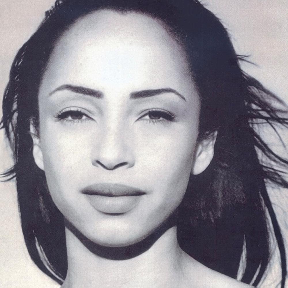Sade vinyl album cover: black-and-white close-up portrait of woman