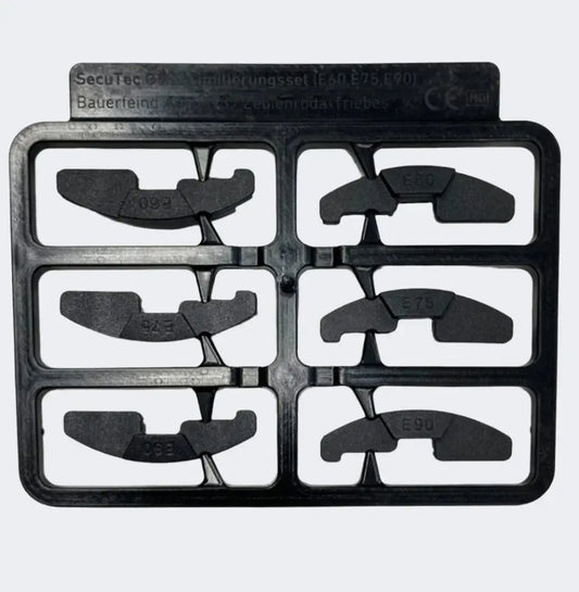 Knee brace insert set with multiple dark pads in a black tray