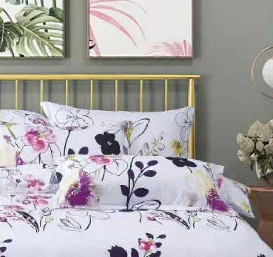 Super king duvet cover with white base and purple floral and pink blossom pattern