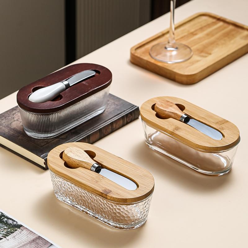 Glass butter dish set with wooden lids and matching spreading tools