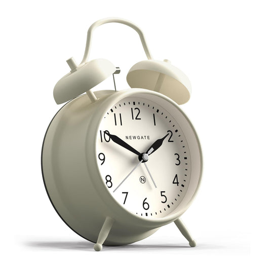 Cream twin-bell alarm clock with large round dial and visible clock hands