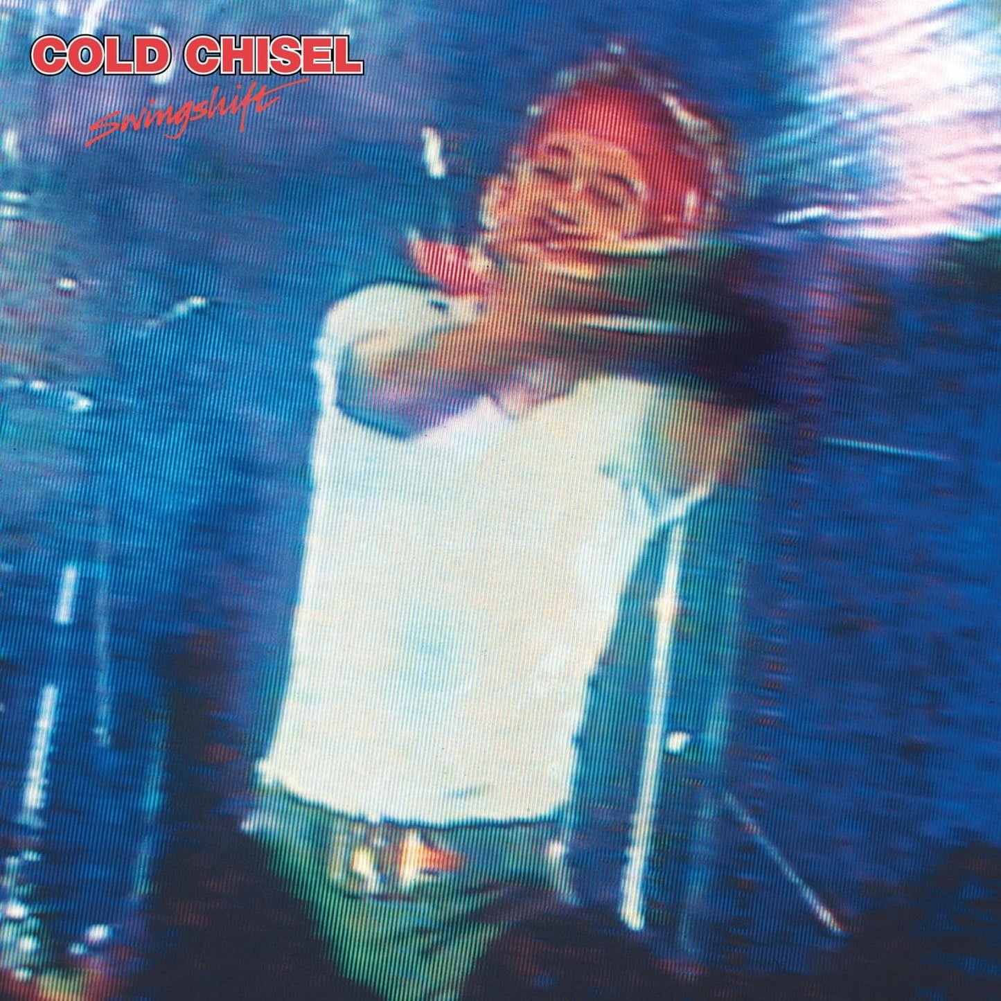 Double vinyl album cover with band member in red jacket and blue lighting