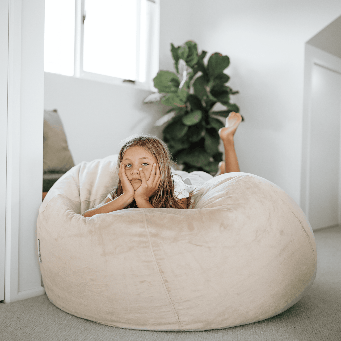 Champagne latte faux fur bean bag with wide scoop shape