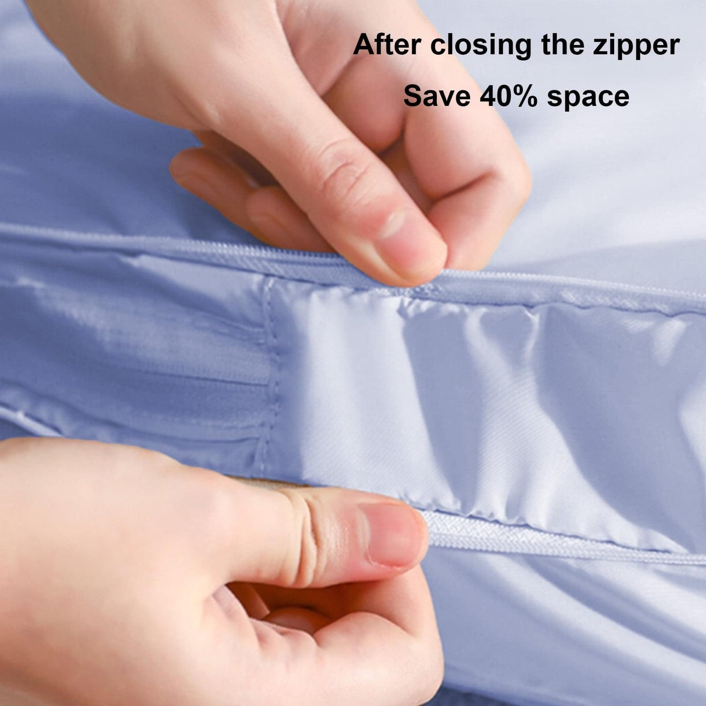 Hands zipping light blue compression organizer bag with reinforced zipper track