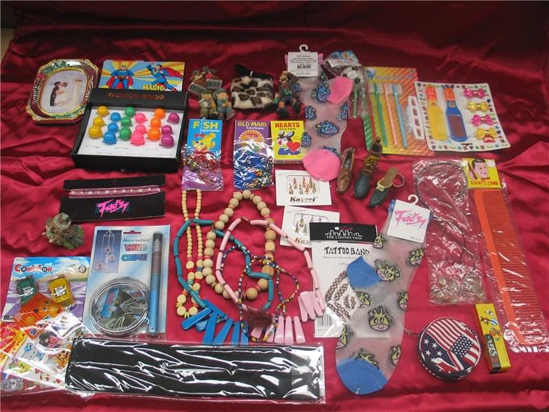 Assorted lucky-dip toys and accessories set with bracelets, cards, and games