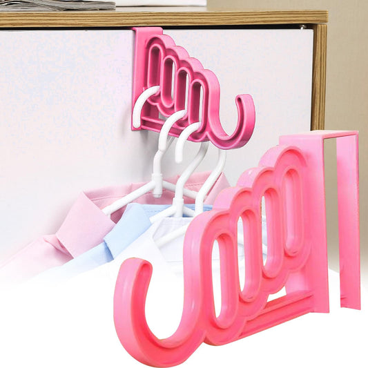Pink over-the-door hook rack with five curved hooks for hanging coats and hats