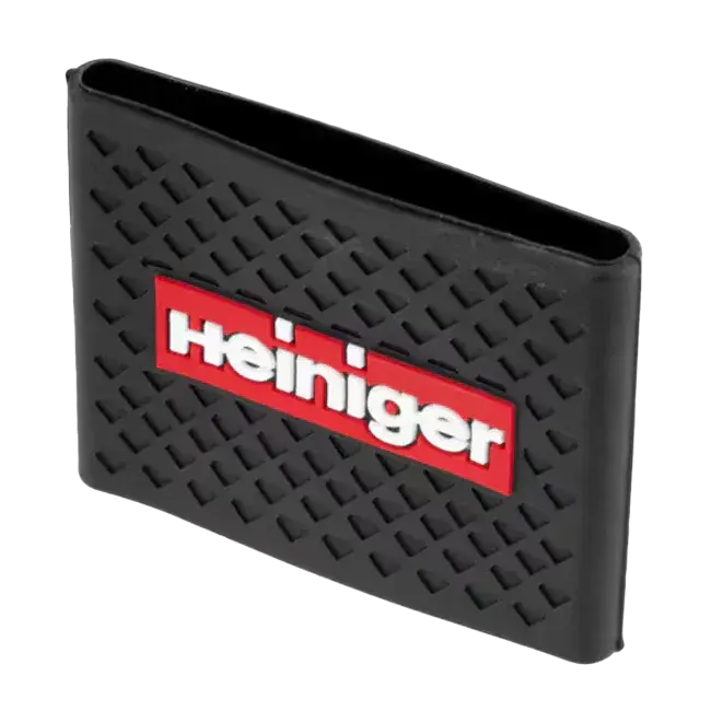 Black anti-slip clipper grip with raised tread texture and red Heiniger logo panel
