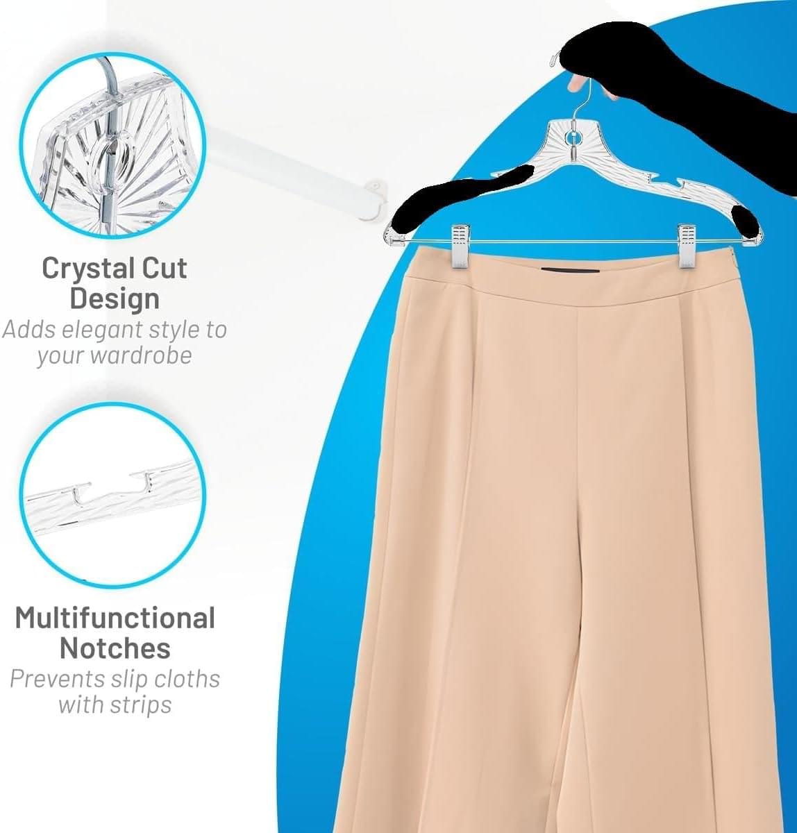 Beige pants on crystal-cut plastic hanger with adjustable metal clips and swivel hook