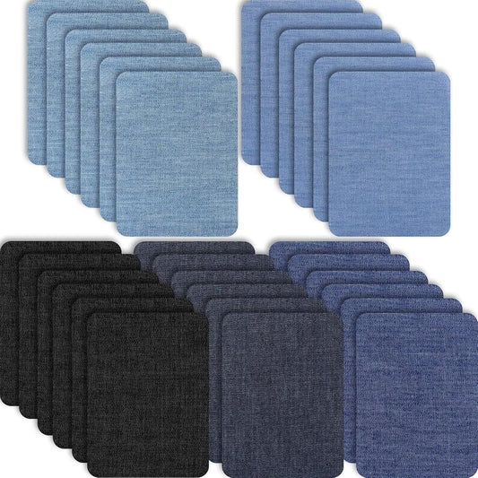 Denim repair patches, layered adhesive rectangles in blue and black colors