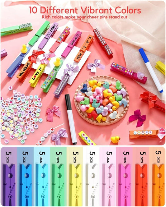 Colorful wooden clothespins with metal springs, arranged in vibrant rainbow tones