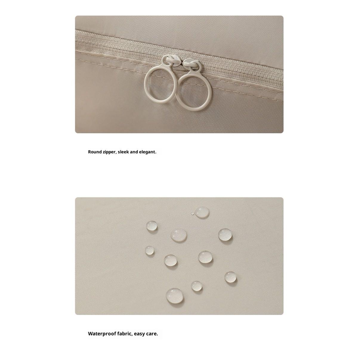 Beige packing cube close-up of double round zipper pulls