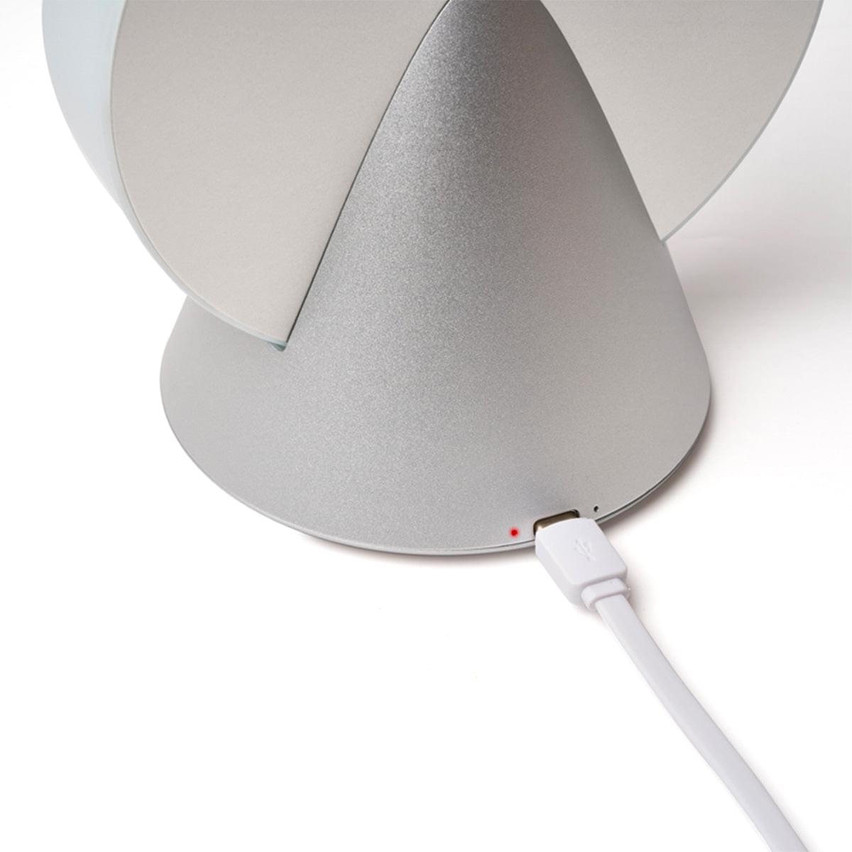 Lexon portable LED lamp, aluminum conic body with USB cable plugged in