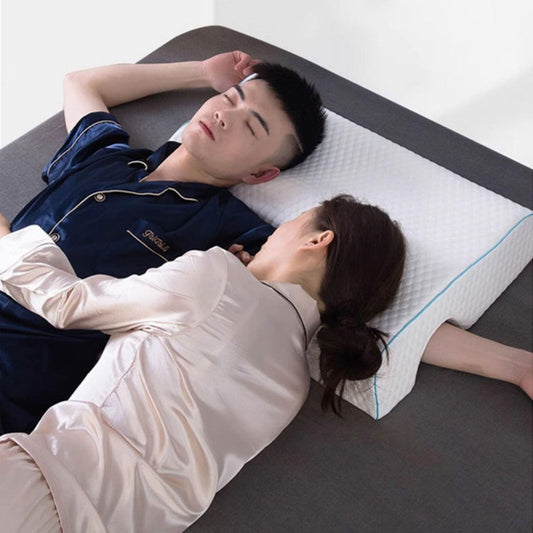 Double sleep arch pillow with contoured neck area and arm cutout, white with blue trim