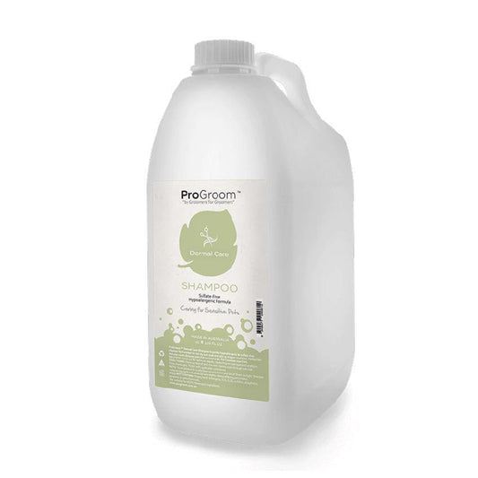 Dermal care shampoo bottle in white with green label on back and ridged cap