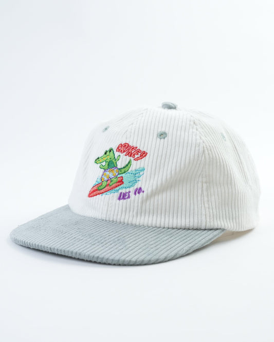 Ribbed baseball cap in light gray with embroidered green gator patch and logo.