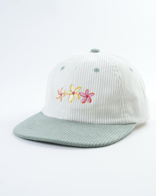 White ribbed cap with teal brim and multicolor flower embroidery