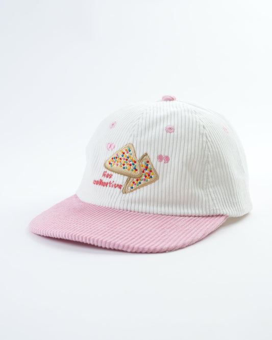 Children's striped cap with pink brim, embroidered fairy bread design